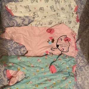 Newborn onesies pajamas only worn a couple of times